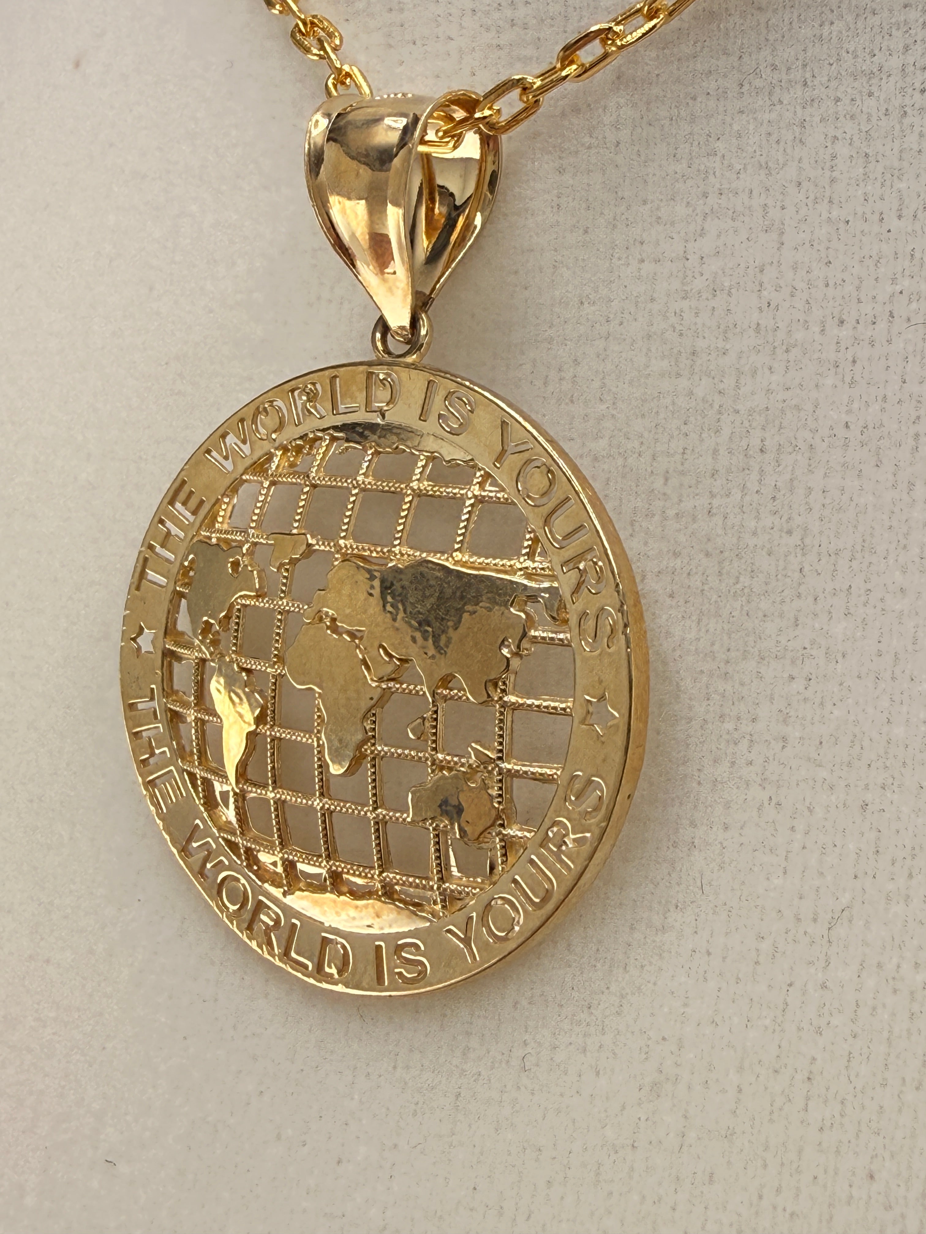 14K Gold “The World Is Yours” Map Pendant