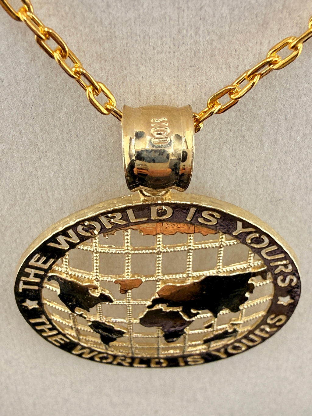 10K Solid Gold “The World Is Yours” Map Pendant